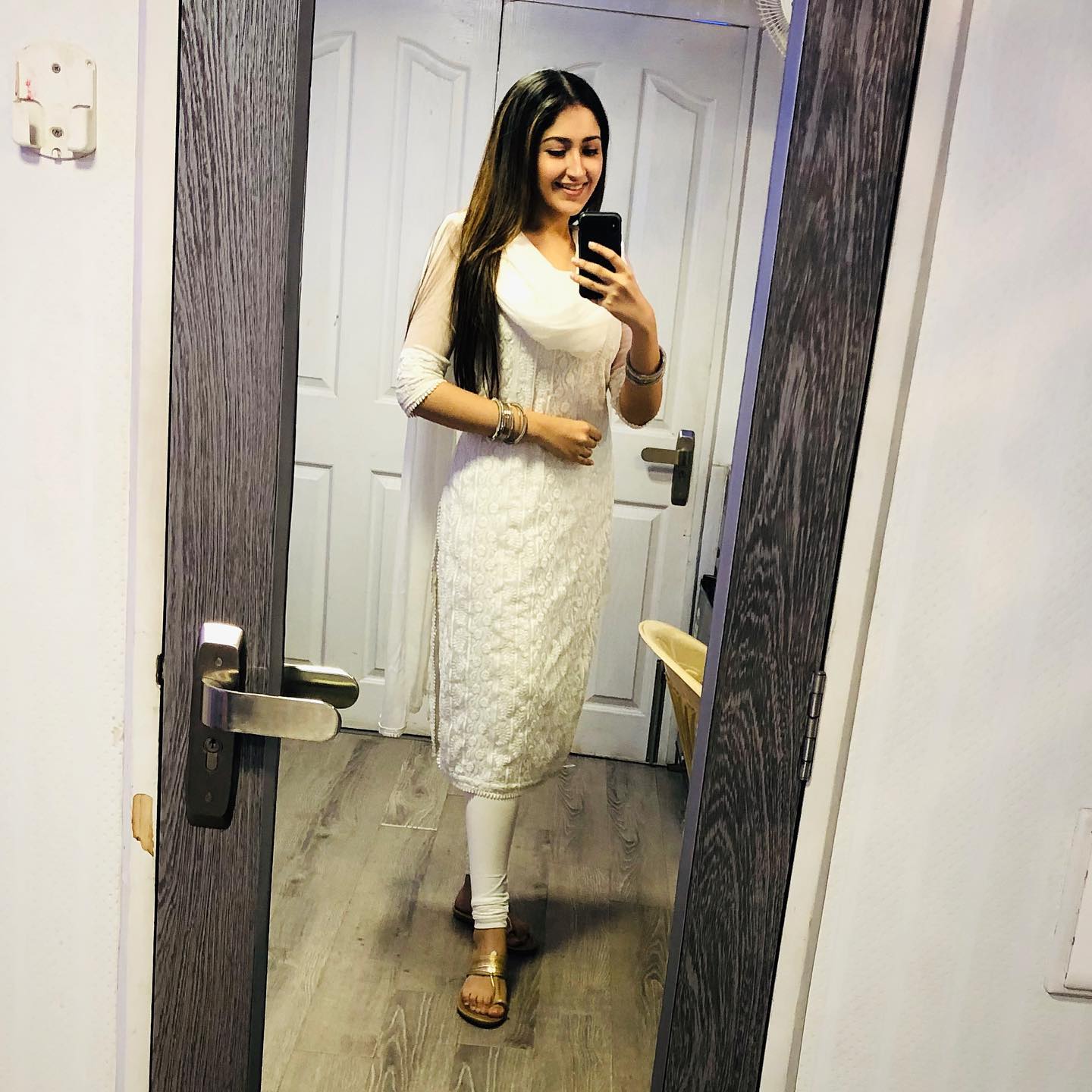 Strategist reviewing charts on a laptop.